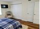 Comfortable bedroom with a wardrobe at 1640 Juno Trl # 101A, Astor, FL 32102