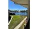 Enjoy the scenic lake view with well-maintained lawn at 1640 Juno Trl # 205B, Astor, FL 32102
