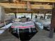 Boat suspended in lift under covered dock at 1640 Juno Trl # 205B, Astor, FL 32102
