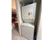 Stackable washer and dryer in the home, conveniently located near the dining area at 1640 Juno Trl # 205B, Astor, FL 32102