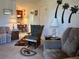 Comfortable living room with view to kitchen/dining, and palm tree decor at 1640 Juno Trl # 205B, Astor, FL 32102