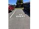 Designated guest parking space with 'AB Guest' marked on the asphalt surface at 1640 Juno Trl # 205B, Astor, FL 32102