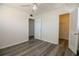 This bedroom boasts wood floors, a ceiling fan and a walk-in closet at 1920 E Edgewood Dr # D1, Lakeland, FL 33803