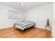 Bedroom with wood floors, ceiling fan and a neutral color scheme at 1928 South Blvd, Maitland, FL 32751