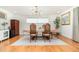 Formal dining area with classic furnishings, ample light, and an elegant chandelier at 1928 South Blvd, Maitland, FL 32751