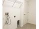 Functional laundry room including a utility sink and washer/dryer hookups at 2117 Lincoln Ln, Bartow, FL 33830