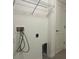 Functional laundry room featuring utility connections and storage shelves at 2117 Lincoln Ln, Bartow, FL 33830