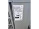 Label on outdoor AC unit showing model and manufacture information at 2336 Nansen Ave, Orlando, FL 32817