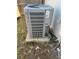 Outdoor AC unit on a concrete slab with mature landscaping at 2336 Nansen Ave, Orlando, FL 32817