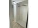 Walk-in closet features open shelving offering customizable storage options in the home at 2336 Nansen Ave, Orlando, FL 32817
