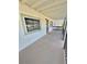 Inviting front porch with neutral colors and cozy welcome mat at 2336 Nansen Ave, Orlando, FL 32817