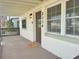 Inviting front porch with neutral colors and cozy welcome mat at 2336 Nansen Ave, Orlando, FL 32817