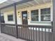Inviting front porch with neutral colors and cozy welcome mat at 2336 Nansen Ave, Orlando, FL 32817