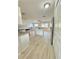 Open kitchen concept with island, granite countertops, stainless steel appliances and an abundance of natural light at 2336 Nansen Ave, Orlando, FL 32817