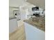 Modern kitchen features granite countertops and stainless steel appliances at 2336 Nansen Ave, Orlando, FL 32817