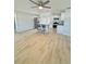 Bright, open-concept living space featuring modern flooring and neutral walls at 2336 Nansen Ave, Orlando, FL 32817