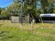 Backyard with a utility pole near the property at 24047 Ermine Rd, Astor, FL 32102