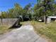 Backyard with a storage shed at 24047 Ermine Rd, Astor, FL 32102