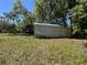 Storage shed in the backyard at 24047 Ermine Rd, Astor, FL 32102