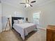Inviting bedroom with neutral tones, plush carpeting, and abundant natural light at 302 W Park St, Lakeland, FL 33803