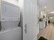 Stacked washer and dryer, showcasing convenience and space-saving design in laundry area at 302 W Park St, Lakeland, FL 33803