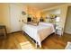 Comfortable bedroom featuring a mirrored wall, closet, and charming decor at 334 Palo Verde Dr, Leesburg, FL 34748