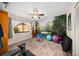 Bright exercise room with ceiling fan, decorative wall art, and work out equipment at 365 N Spaulding Cv, Lake Mary, FL 32746