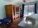 Spacious exercise room features a sauna, exercise equipment, and beautiful backyard views at 365 N Spaulding Cv, Lake Mary, FL 32746
