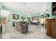 Spacious living room featuring comfortable seating, stylish decor, and an abundance of natural light at 365 N Spaulding Cv, Lake Mary, FL 32746