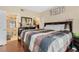 Comfortable bedroom featuring a large bed and en-suite bathroom and closet space at 5526 P G A Blvd # 4911, Orlando, FL 32839