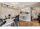 Comfortable dining room with table, chairs, and bar seating for modern living at 5526 P G A Blvd # 4911, Orlando, FL 32839