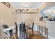 Cozy dining area with modern table, chairs, and bar seating at 5526 P G A Blvd # 4911, Orlando, FL 32839