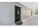 Inviting front door with wreath, welcome mat, and visible unit number at 5526 P G A Blvd # 4911, Orlando, FL 32839