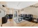 Comfortable living room with wood floors, sliding glass doors and modern decor at 5526 P G A Blvd # 4911, Orlando, FL 32839