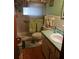 Bathroom featuring a vanity and shower/tub combination at 6832 Oswego Dr, Mount Dora, FL 32757
