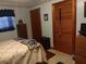 Bedroom featuring neutral walls, two closets, a bed, and one window at 6832 Oswego Dr, Mount Dora, FL 32757