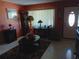 Cozy living room featuring warm colors, decorative furnishings, and a welcoming ambiance at 6832 Oswego Dr, Mount Dora, FL 32757