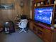 Comfortable living room with a TV and desk at 6832 Oswego Dr, Mount Dora, FL 32757