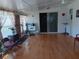Sunroom featuring neutral walls and a sliding glass door at 6832 Oswego Dr, Mount Dora, FL 32757
