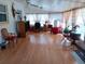 Sunroom featuring neutral walls and many windows at 6832 Oswego Dr, Mount Dora, FL 32757
