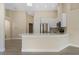 Bright kitchen with white cabinets, stainless steel appliances, and a modern faucet at 9324 Pecky Cypress Way, Orlando, FL 32836