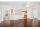 Spacious living area features wood floors, neutral walls, and an open concept layout at 9651 Old Marsh Ct, Orlando, FL 32832