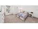 Bright bedroom features new carpet, large windows, and ample sunlight at 9790 Amber Chestnut Way, Winter Garden, FL 34787