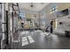 Community gym featuring fitness equipment and large windows for natural light at 9790 Amber Chestnut Way, Winter Garden, FL 34787