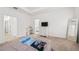 Primary bedroom featuring a comfortable bed and plenty of natural light at 9790 Amber Chestnut Way, Winter Garden, FL 34787