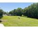 Beautiful lawn and trees, ready for a new home near the water and boat docks at 106 Palo Verde Dr, Leesburg, FL 34748