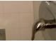 Modern faucet in neutral bathroom features clean design at 1104 Illinois Ave, St Cloud, FL 34769