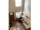 Bright living room showcasing hardwood floors, neutral sofa, and high ceilings at 1104 Illinois Ave, St Cloud, FL 34769
