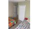 Bright bedroom with two beds and ample closet space at 1134 S Pine Ridge Cir # 34, Sanford, FL 32773