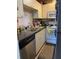 Compact kitchen design with stainless steel dishwasher at 1134 S Pine Ridge Cir # 34, Sanford, FL 32773